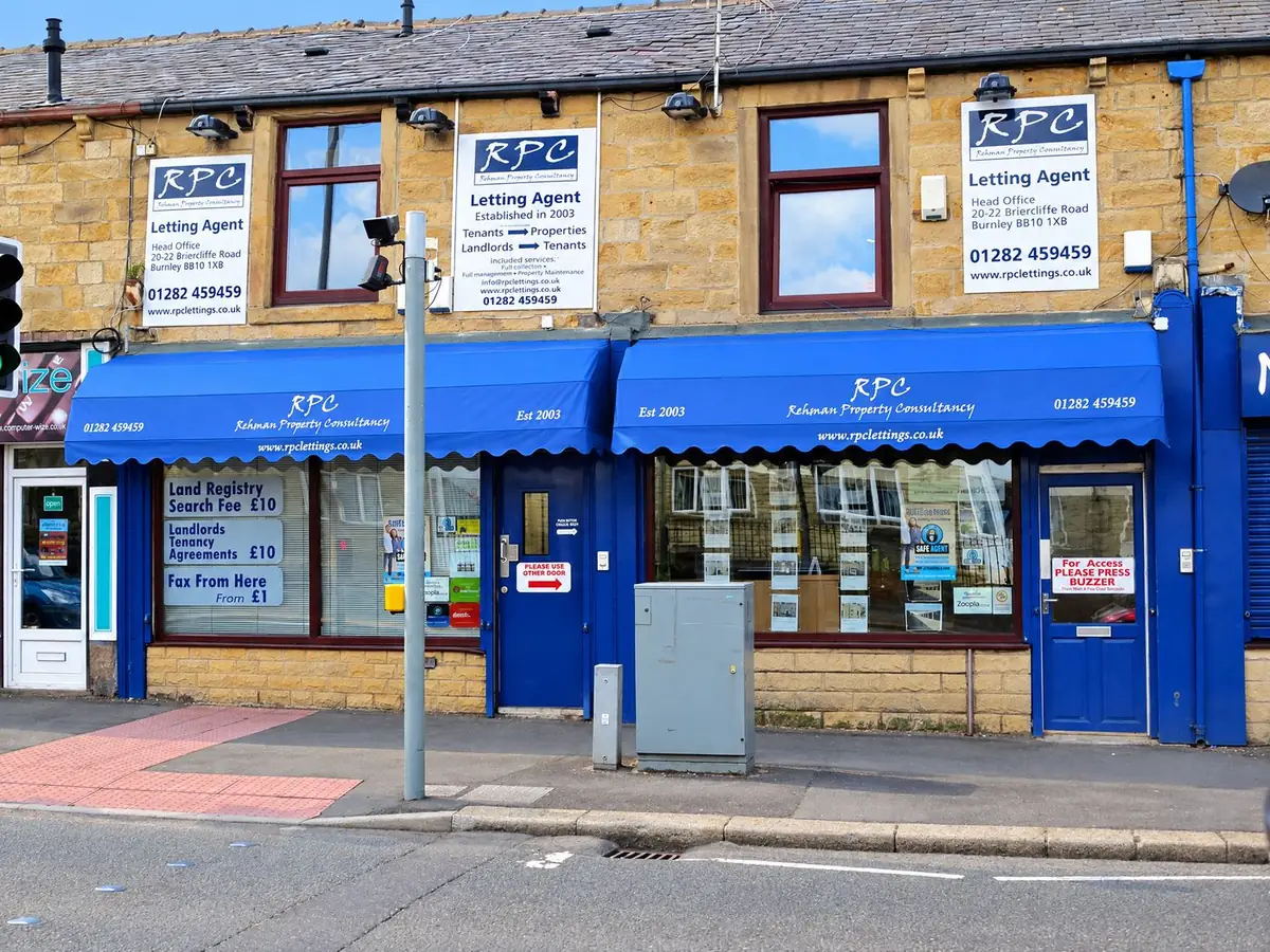 RPC Rehman Property Consultancy office on Briercliffe Road, Burnley, with blue awnings